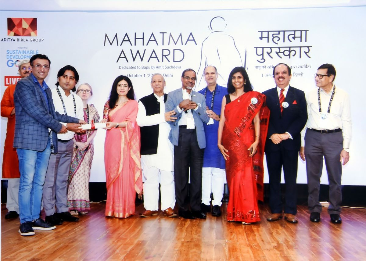 Mahatma Award 2022 ceremony - Rise Against Hunger India team receiving the award in Delhi