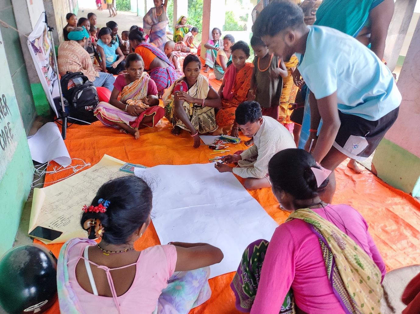 Community members mapping risks and hazards