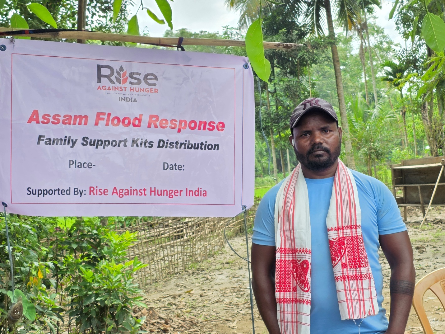 Dipu Kandha helping organize rescue efforts for families stranded by floodwaters