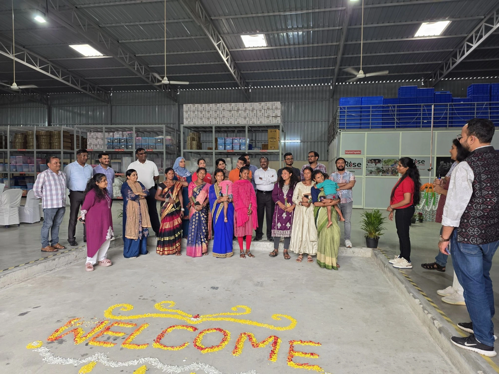 Welcoming the Bonda tribal women entrepreneurs at the Rise Against Hunger India warehouse in Bengaluru