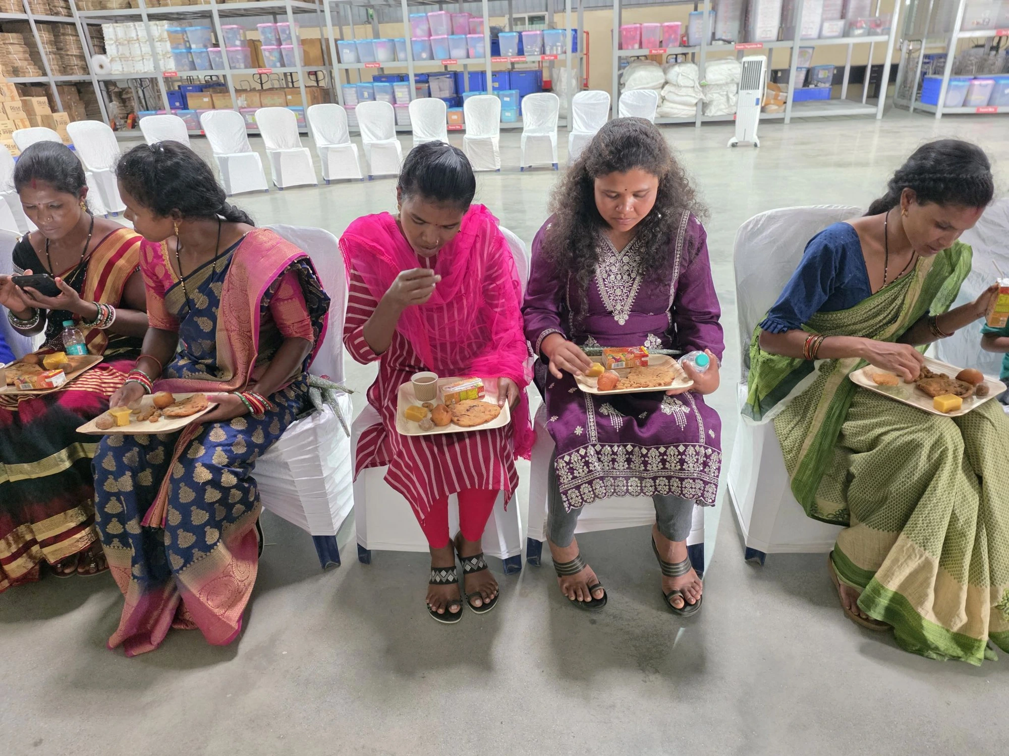 Bonda women directors of the Farmer Producer Company sharing a meal at the RAHI Bengaluru office