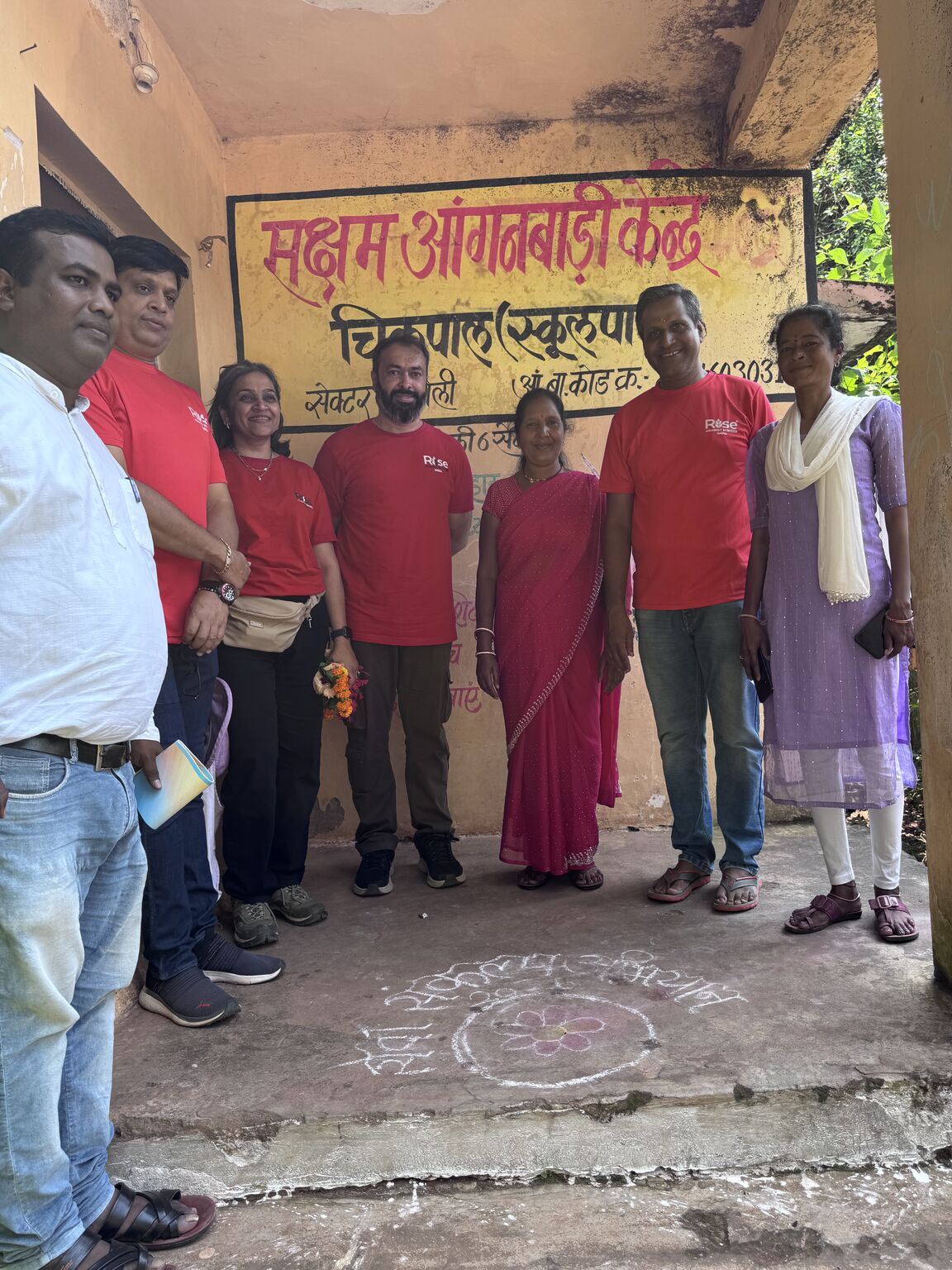 RAHI team visiting the Saksham Anganwadi Kendra at Chikrapal, Dantewada, with rangoli drawn to welcome visitors