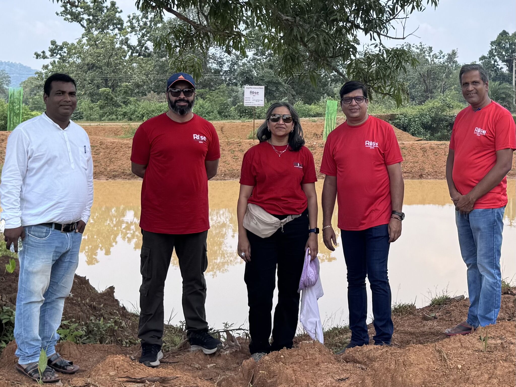 RAHI team at a community irrigation pond built as part of the sustainable agriculture program in Dantewada