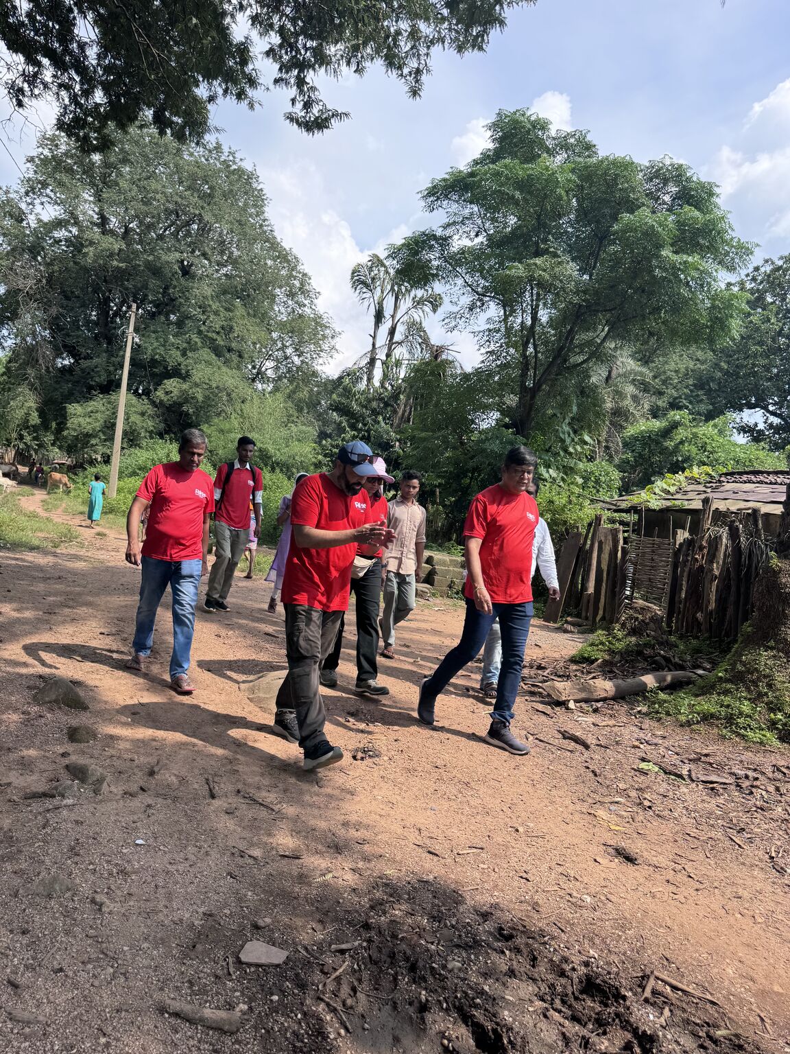 RAHI team walking through a village lane in the Dantewada district during the field visit
