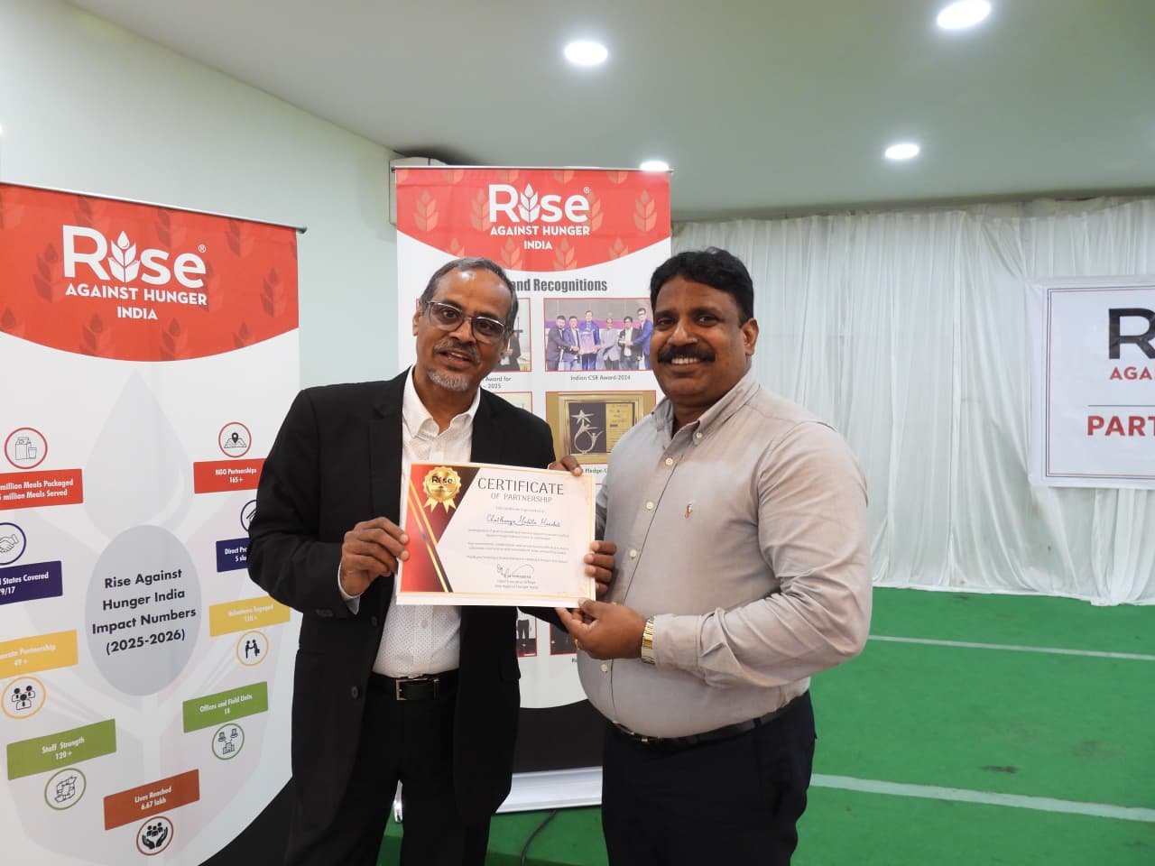 Chaithanya Mahila Mandali recognized with a Certificate of Partnership at the Rise Against Hunger India Hyderabad inauguration