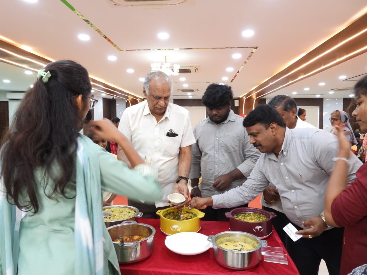 Partners showcasing nutritious preparations made using Rise Against Hunger India meal packets at the Hyderabad inauguration