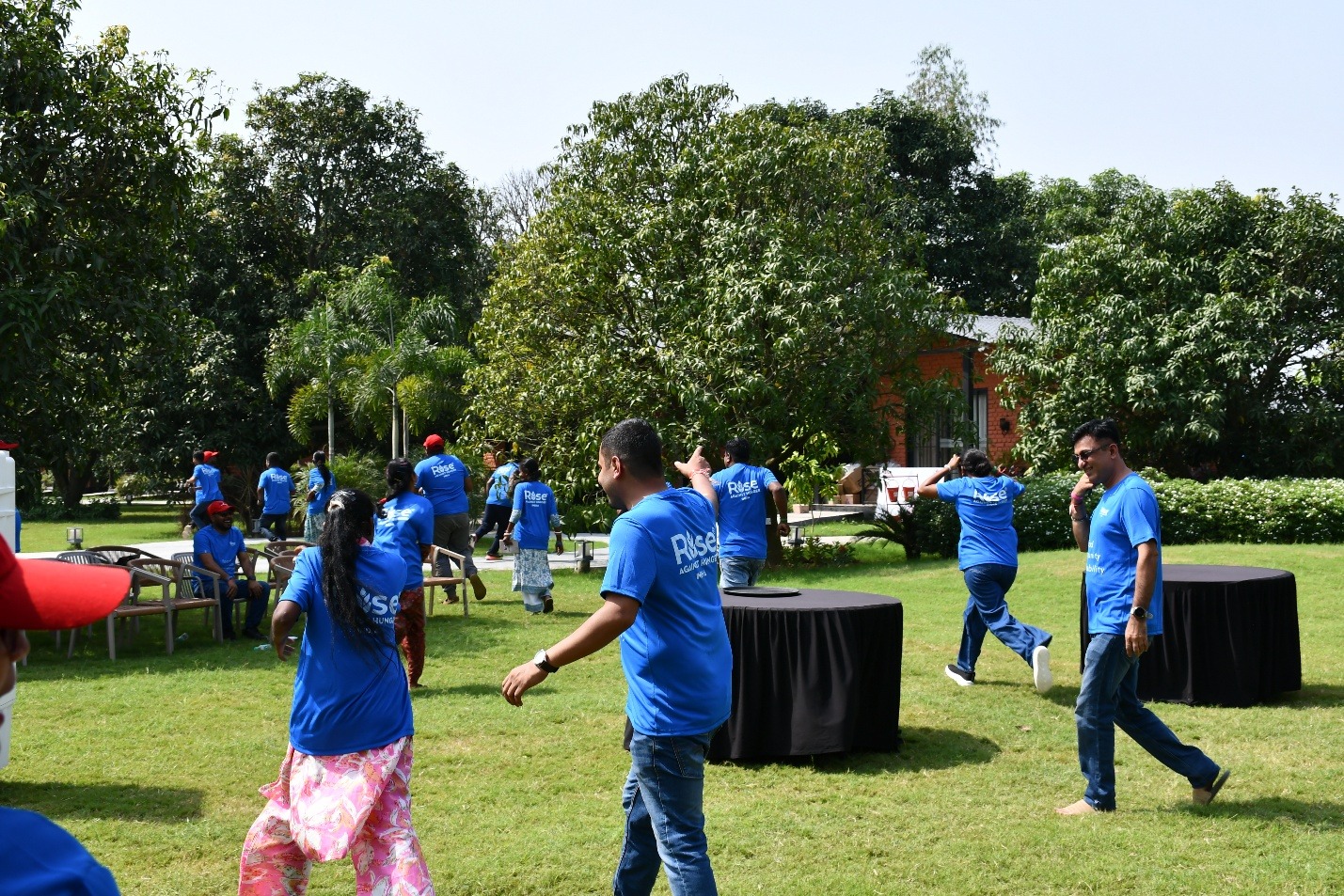 Staff participating in sports, cultural programs and team activities
