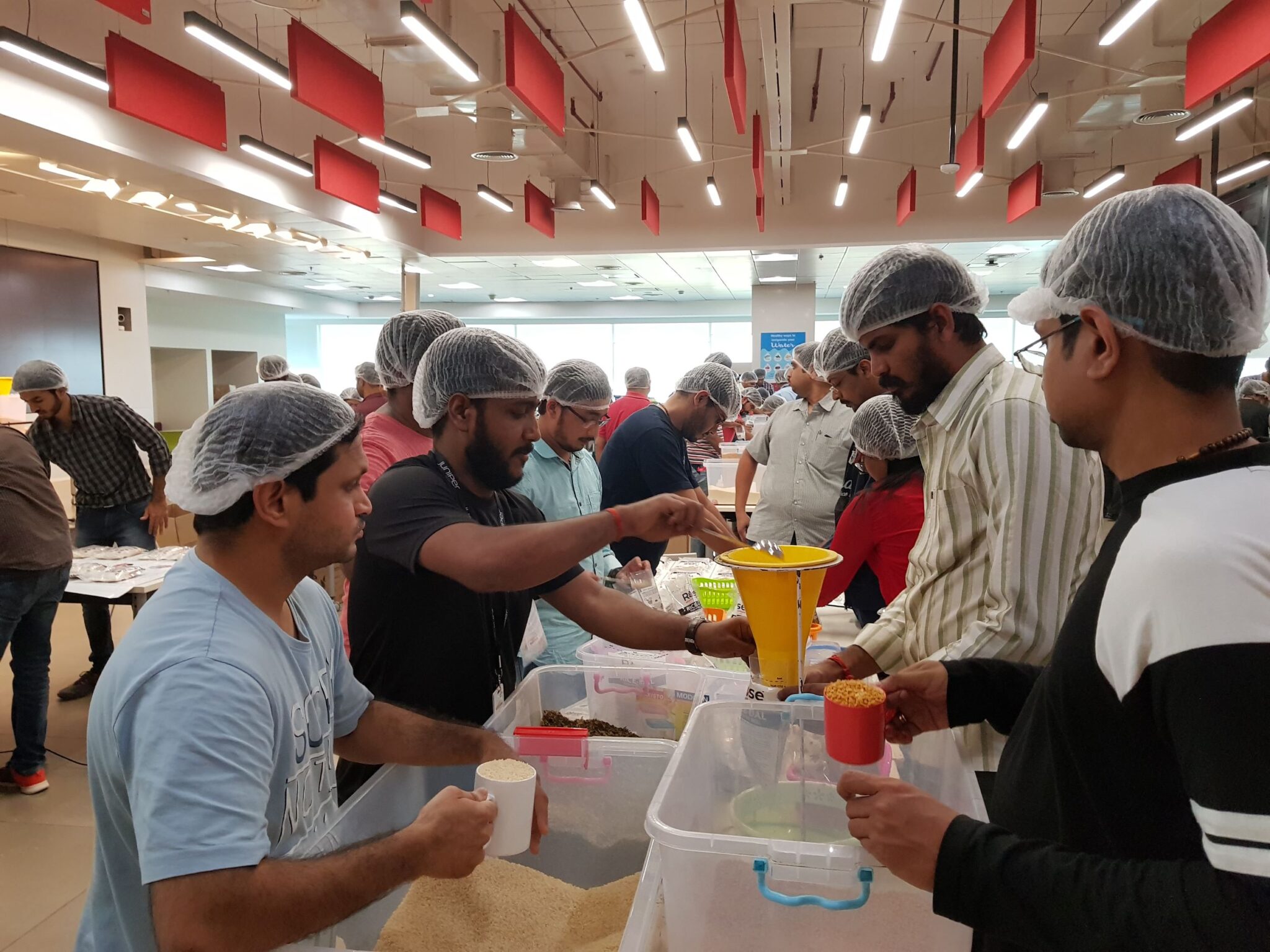Volunteers at a Rise Against Hunger India meal packaging event